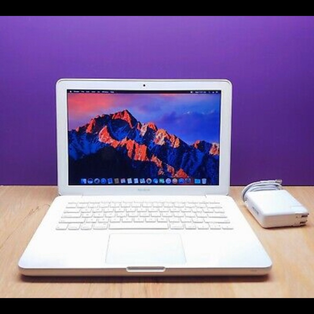 Apple MacBook 2016, with charging cable. 13 inch
